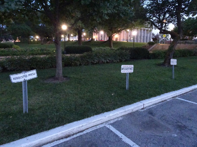 Parking spaces for journalists outside the Capitol.