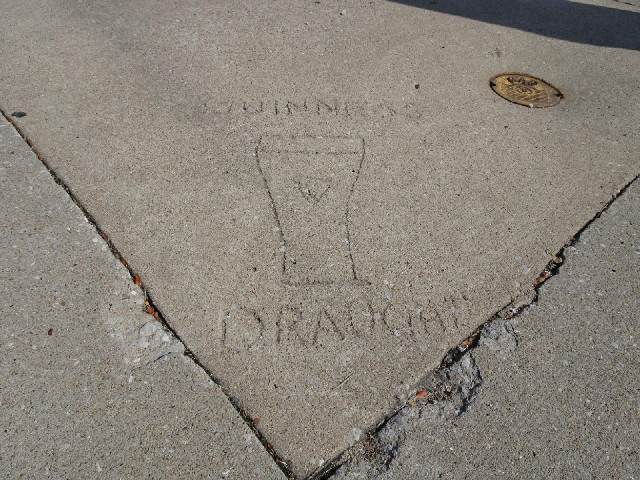 In the pavement outside an Irish pub.