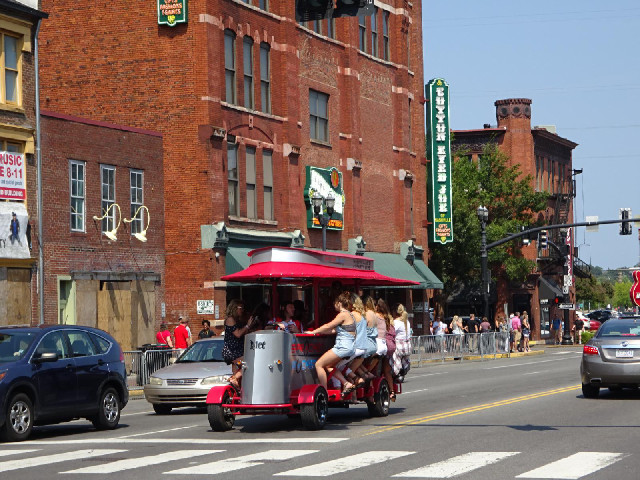 A pedal-powered vehicle with music playing...