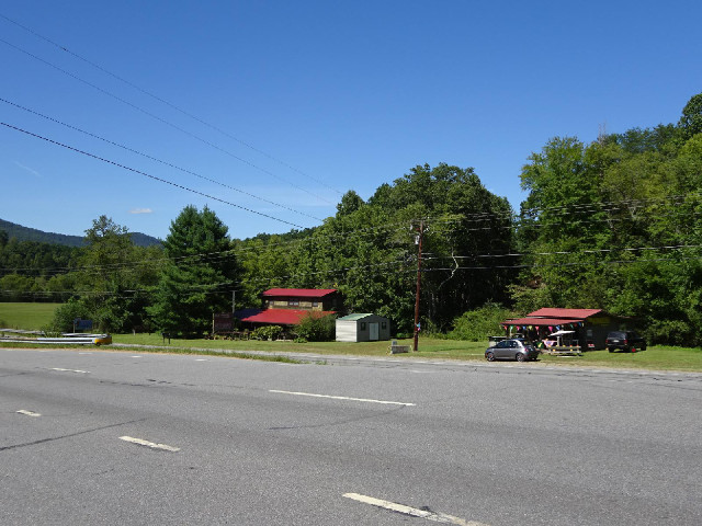 A pair of small roadside shops.