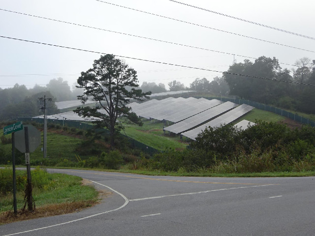 Part of a hilly solar farm.