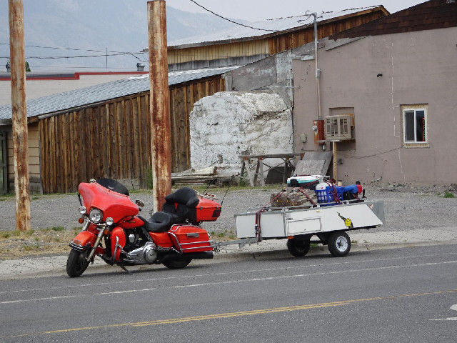 A motorbike with a trailer.