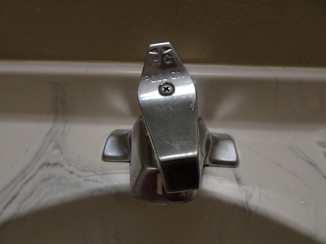 Looking at this tap, I couldn't work out whether it meant that to get hot water, you had to turn it ...