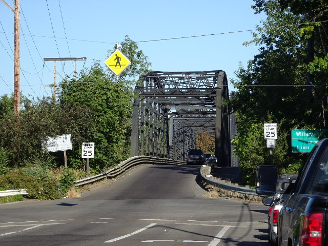 Traffic crossing the river into Corvallis uses the wide concrete bridge which I showed earlier but t...