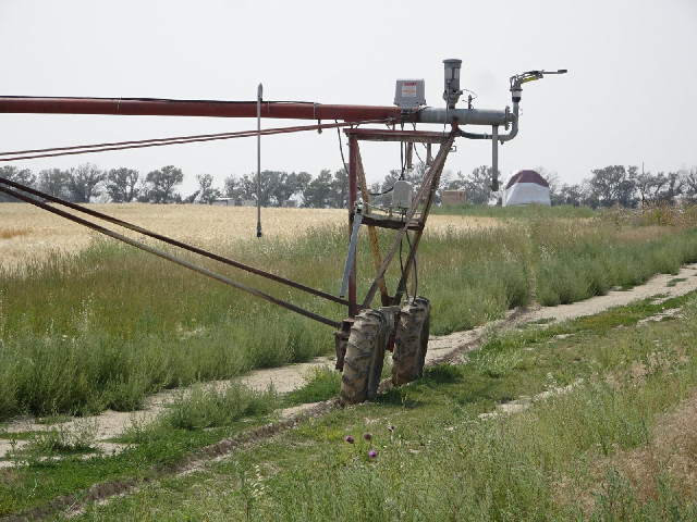 An irrigator in its track.