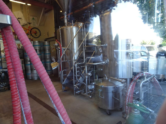 One of the microbrewery restaurants has its brewing equipment on display to the street.
