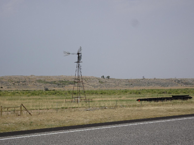 A wind pump. There's also a "nodding donkey" pump just visible on top of the ridge.