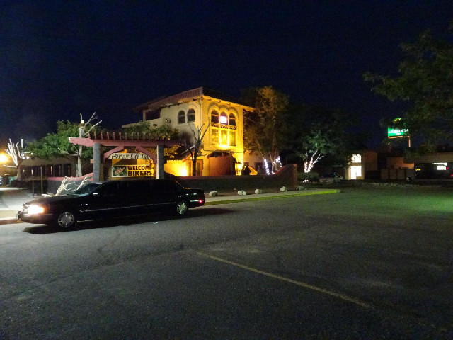 I went to this place for dinner: The Fort Saloon. There's a limousine parked outside with a handwrit...