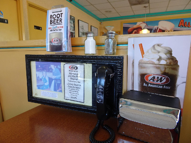 Inside the diner. Each table has a telephone which, according to the label, can be used to order foo...