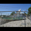 A water treatment facility. The water is very green.