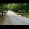 It's a bridge but it's so low that it's almost a ford, and it's got a rough surface.