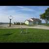 The hoop suggests that there was once some kind of commercial property here. The crosses commemorate...