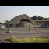 That barn isn't really big enough for that pile of gravel.