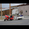 A motorbike with a trailer.