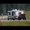 A camper van towing a car is quite a common sight around here. Sometimes the cars themselves are pre...