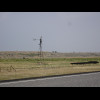 A wind pump. There's also a "nodding donkey" pump just visible on top of the ridge.