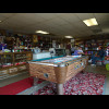 Inside the shop-come-cafe-come-petrol station in Hiland. The door on the left leads to a bar. Appare...