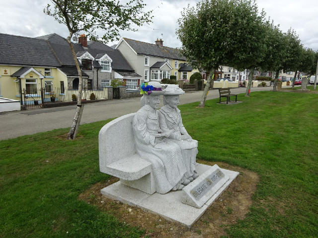 In the village of Oylgate, which seems to go be several different spellings. This statue marks the c...