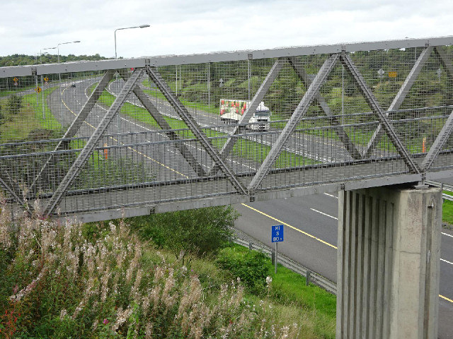 The M1 motorway, seen through a footbridge.