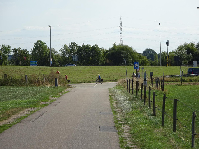 Here's the end of the Netherlands. The border marker is the cone to the right of the road. The cycli...
