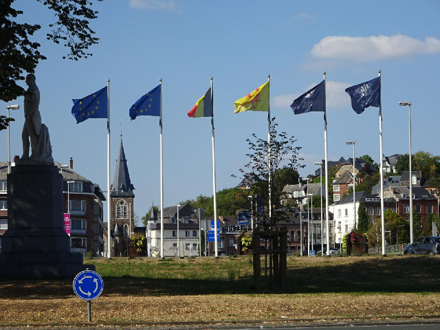 From right to left, the flags of the city, province, country and continent, showing the converntion ...