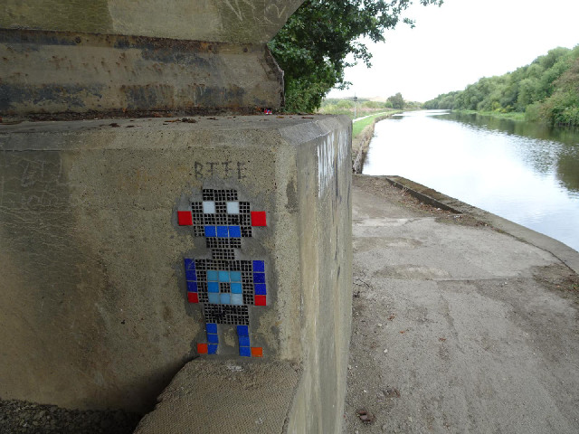 A little robot under a bridge...