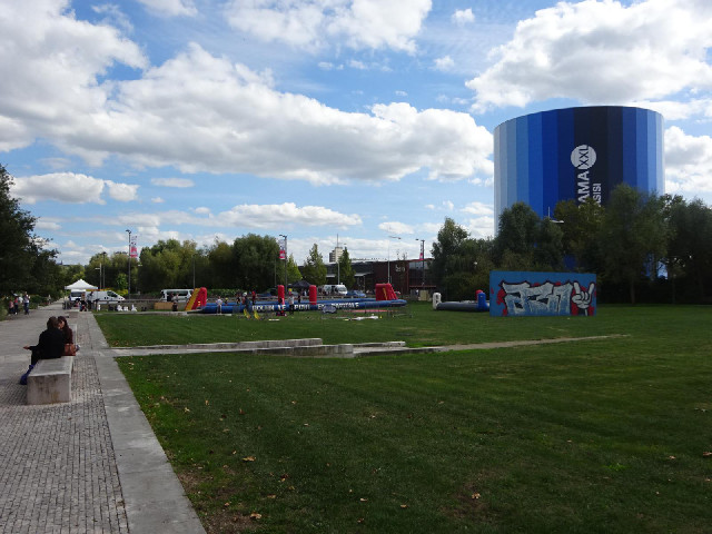In another park nearby are some large inflatable things. The building on the right is some kind of g...