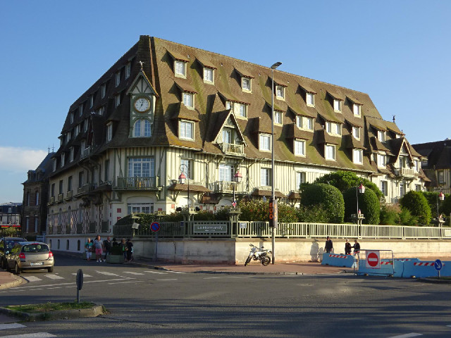 The huge five-star Normandy Hotel. The clock on the corner is a Rolex.