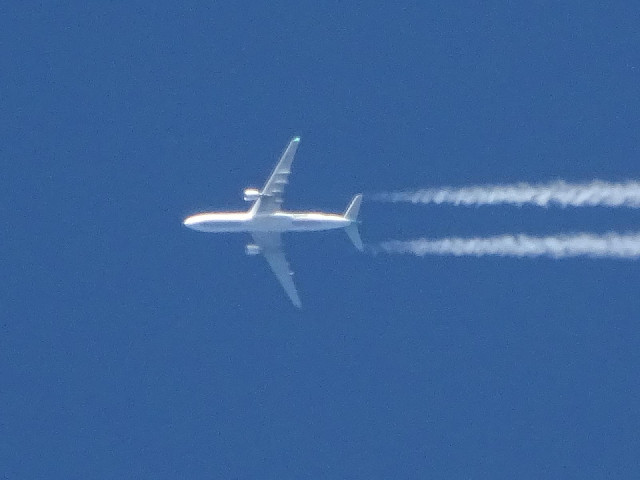 A plane going in the opposite direction.
