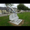 In the village of Oylgate, which seems to go be several different spellings. This statue marks the c...