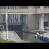 The door opening to connect the moving section to the lower canal. The man in the yellow jacket is p...