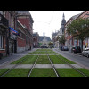 The tram lines also act as little green spaces. Also, I can't help noticing that it still isn't rain...