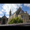 The church at Esquay-sur-Seulles. An information board here points out the sundial mounted on the to...