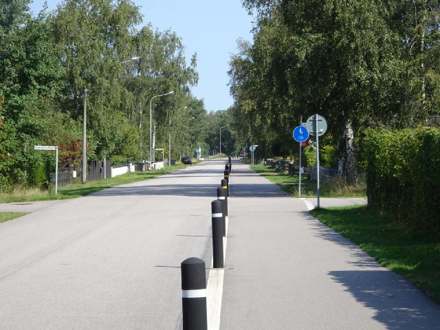 This road with a cycle lane runs for several kilometres a few streets back from the beach.