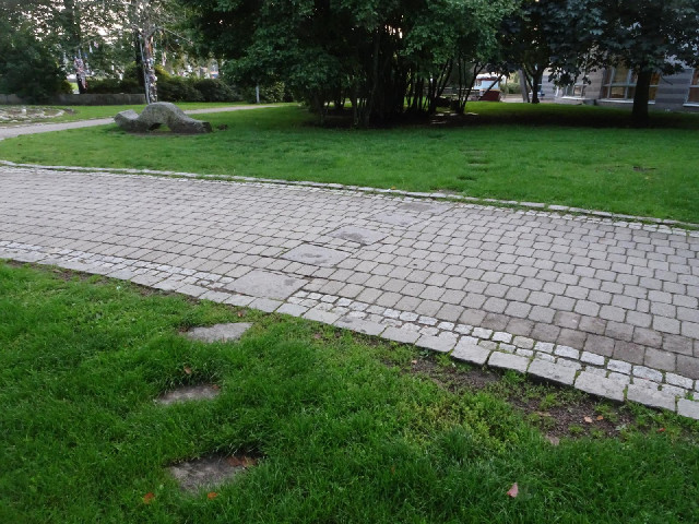 The garden of the library has a meandering path of stepping stones. What I think is funny is that th...