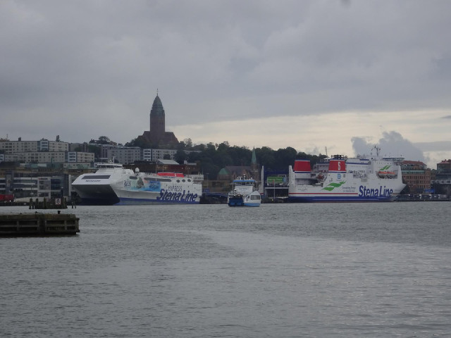 The ship on the right goes to Frederikshavn in Denmark. I don't know what the catamaran is for. The ...