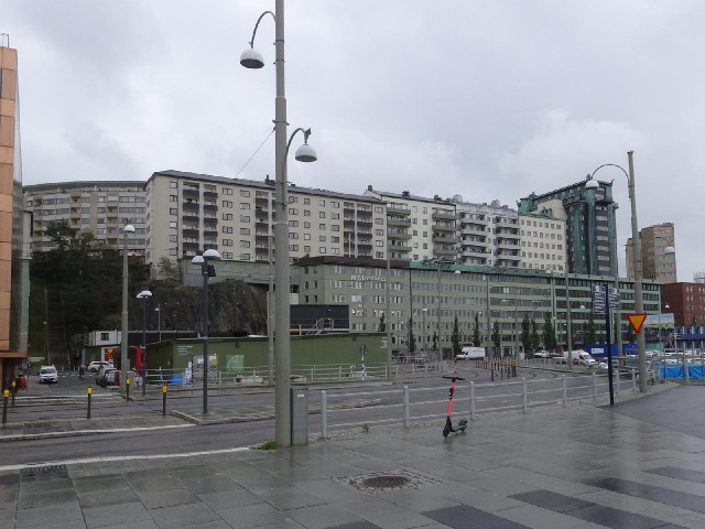 The steps are on the left in this picture. The long green building is an interesting shape. Its left...