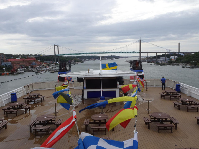 Another view of the bridge but with flags.