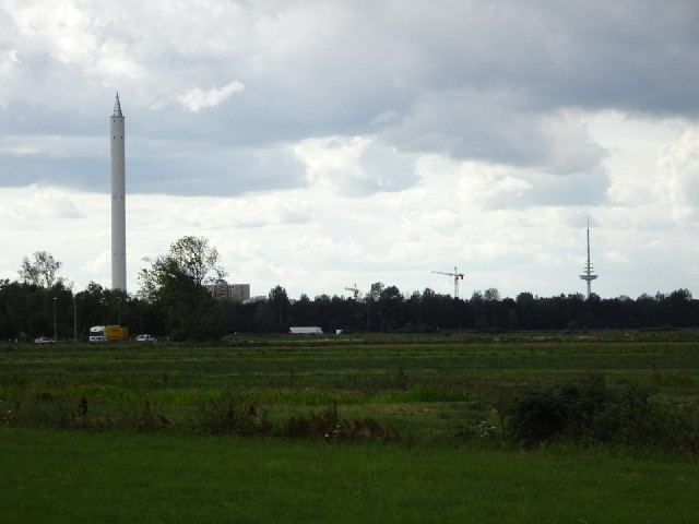 The spire on the left is the Bremen Drop Tower. The inside is a vacuum and scientific experiments ca...