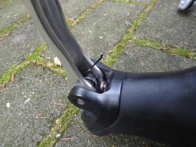 For a few days, this little metal spike has been hanging out of one of the handlebars. It's one end ...