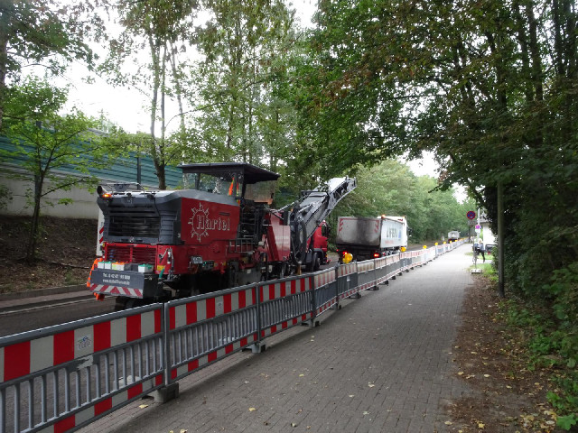 This road is being dug up but the cycle path is still open.