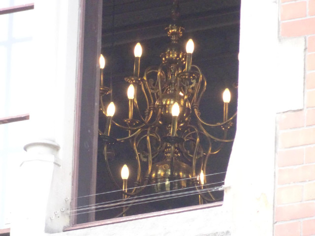 A chandelier in the upstairs room of the building in the previous picture.