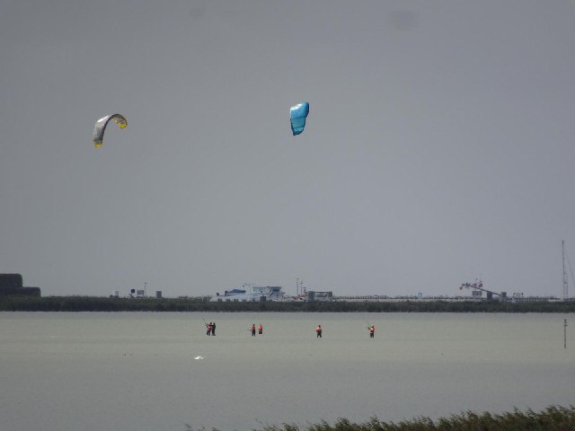 People learning to kite surf.
