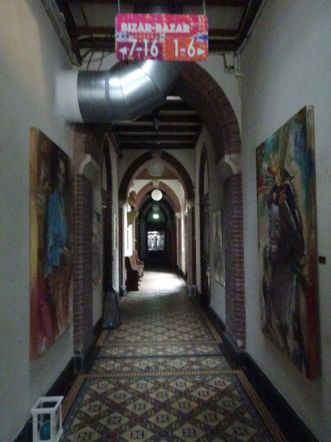 An aisle running along the side of the church downstairs.