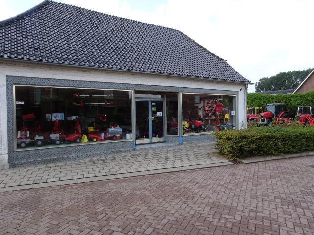 We always need a picture of a place which sells tractors. This place has toy ones too.