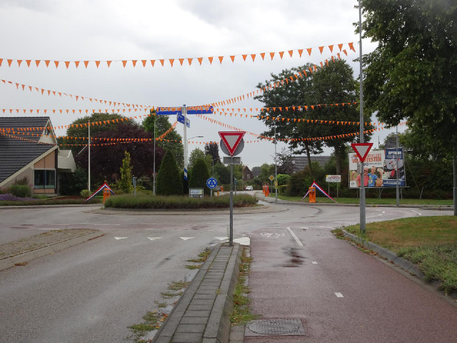 Varsseveld. The orange bollards have pictures of things like glasses of beer and wine on them. There...
