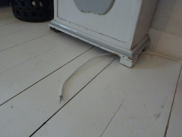 There's a coaxial cable which runs the length of the corridor and ends under the grandfather clock. ...