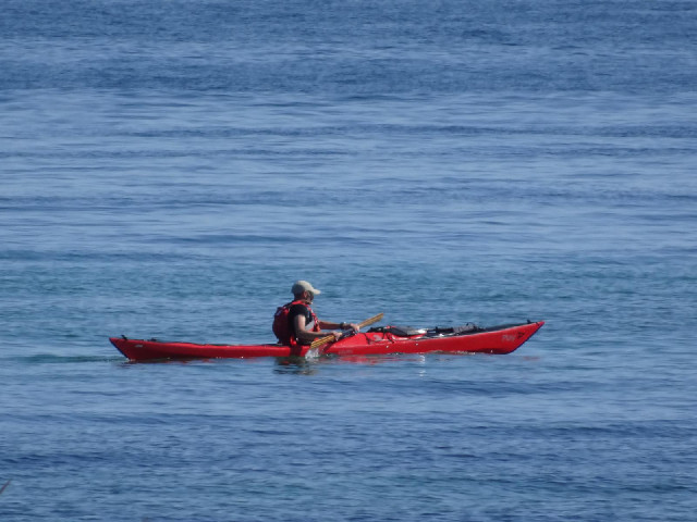 A kayaker.