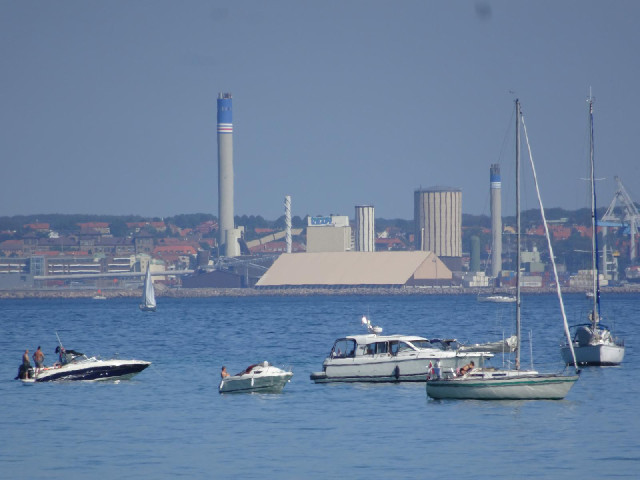 More boats with some Swedish industry in the background.