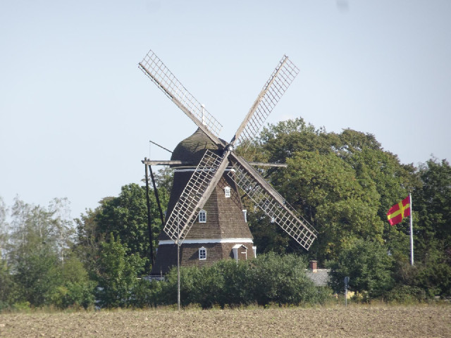 I know you might have seen enough windmills already but this one has a flag next to it.